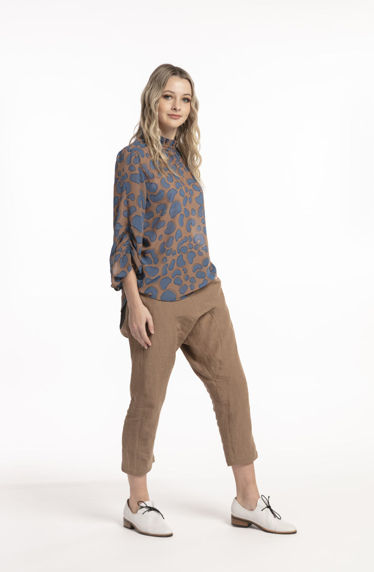 Model wearing Inspiration Top Blue Print side view