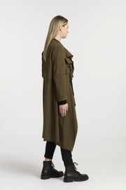 Tall model wearing New Page Coat Olive, back