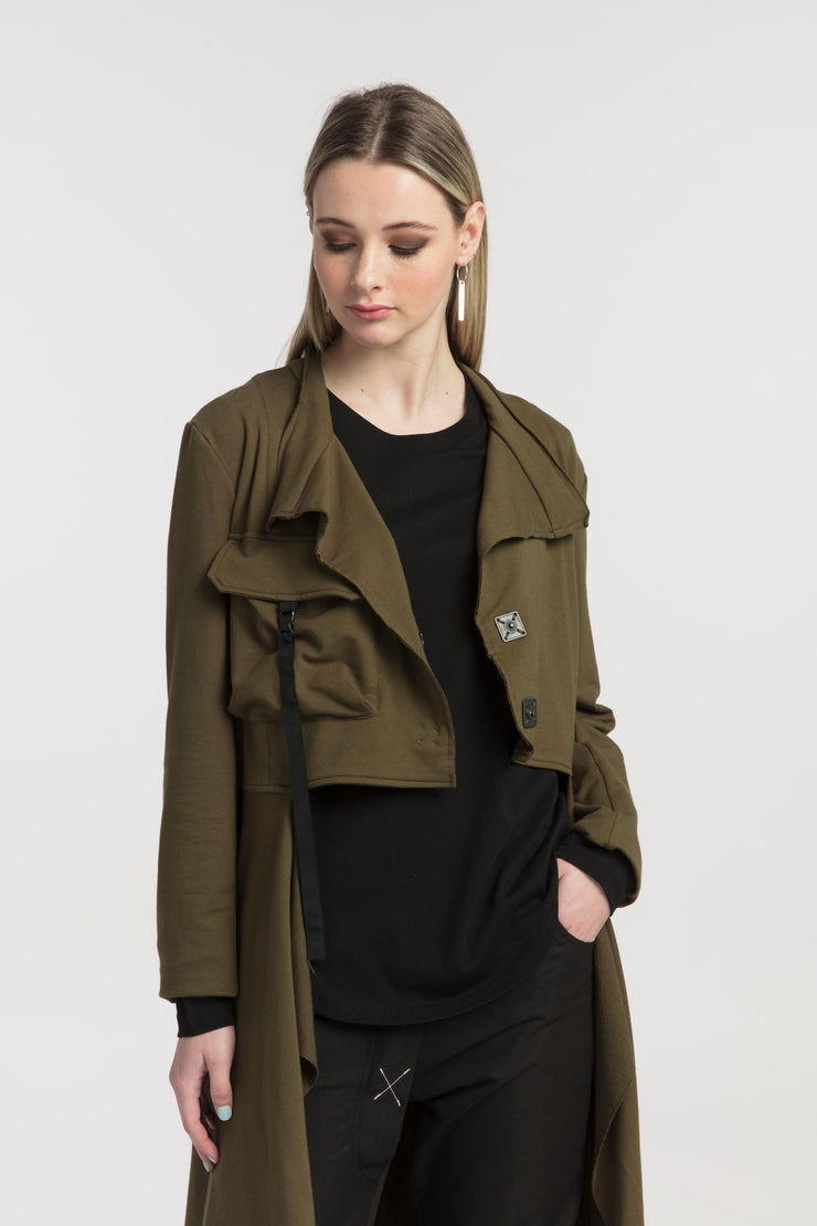 Tall model wearing New Page Coat Olive, close up